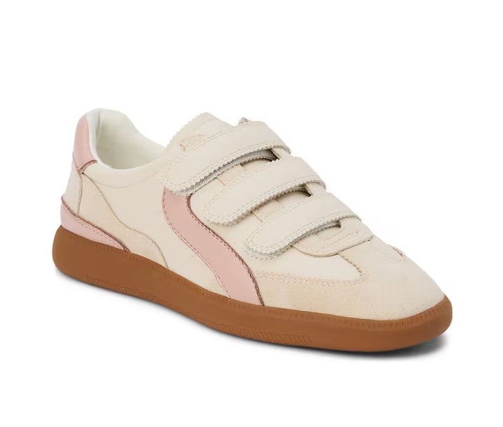 Beige and pink sneaker with brown sole on a white background